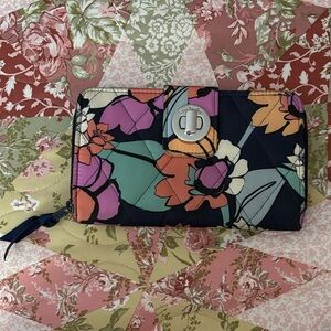 Navy blue/floral vera bradley wallet. (Used once, without tags.)